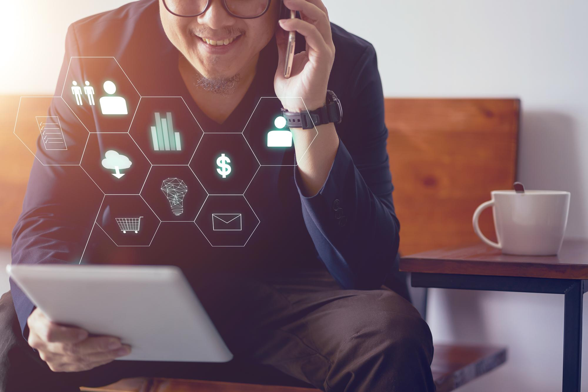 man-holding-digital-tablet-making-online-shopping-banking-payment-blurred-background